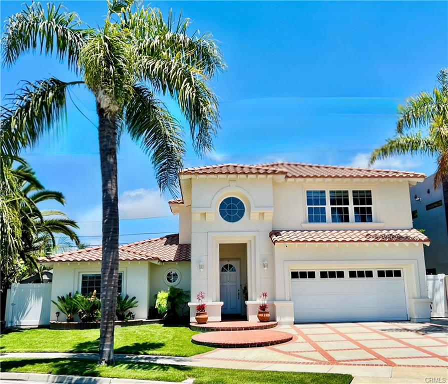 9112 Playa Dr — front elevation of the custom Mediterranean residence
