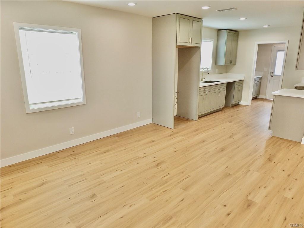 1335 W Burnett St — living area opening to the remodeled kitchen