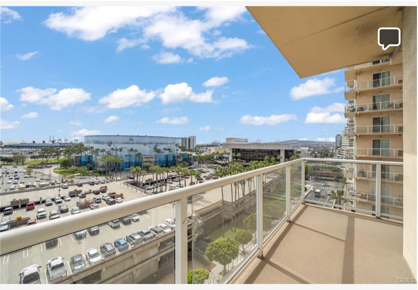 488 E Ocean Blvd #717 — wrap-around glass balcony with panoramic coastline views