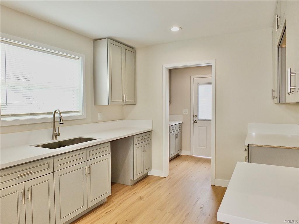 1335 W Burnett St — brand-new kitchen with granite counters and custom cabinetry
