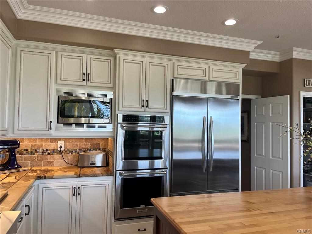 14 Dover — renovated kitchen with double oven and stainless appliances
