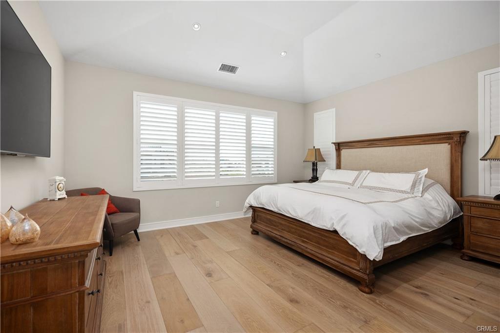 142 Sabbia — primary bedroom suite with designer shutters