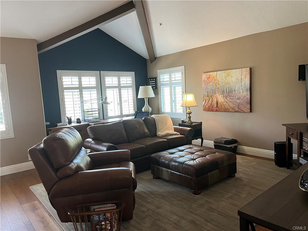 14 Dover — family room with built-ins opening to the kitchen