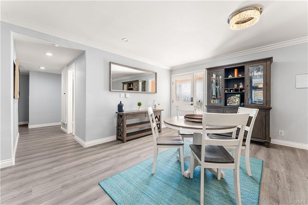 1170 Gleneagles — open-concept great room with waterproof flooring and dual-pane windows