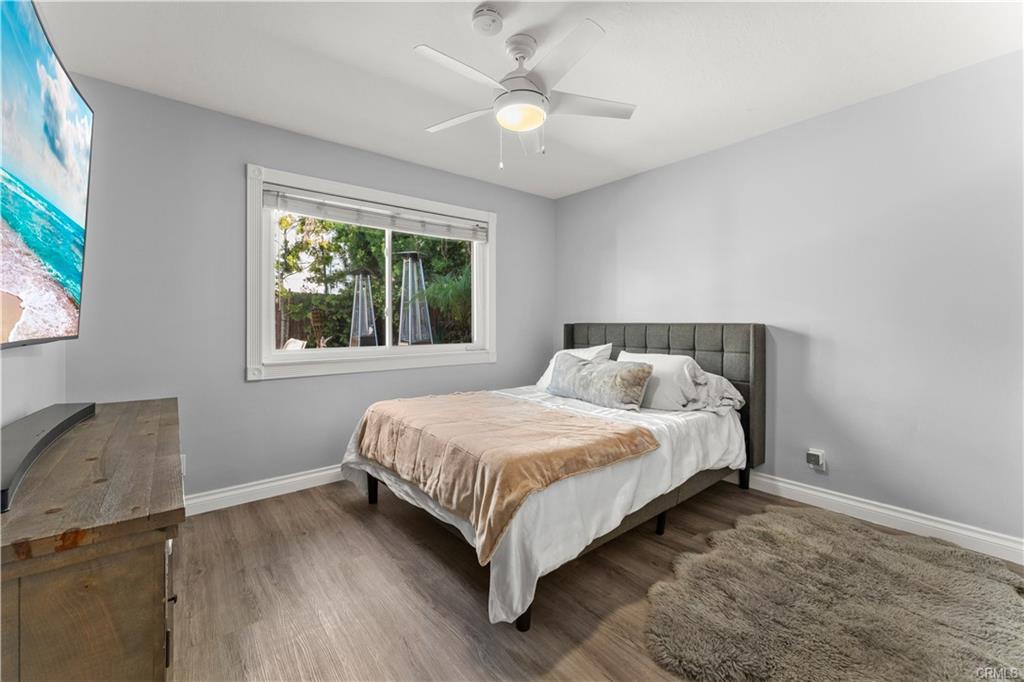 1170 Gleneagles — guest bedroom with ceiling fan and recessed lighting