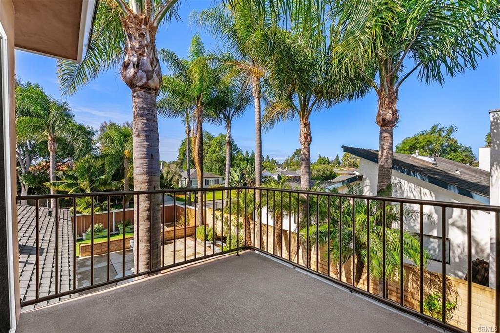 2199 National Ave — private balcony off the primary suite overlooking the backyard