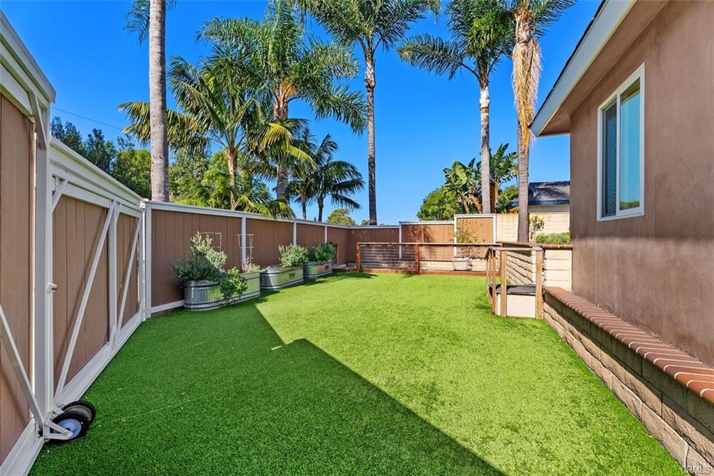 2199 National Ave — grassy side yard along the oversized corner lot