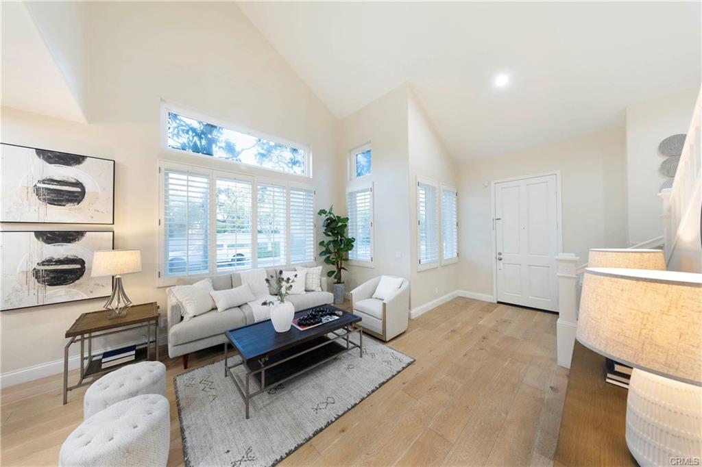 43 Lessay — living room with vaulted ceiling and abundant natural light