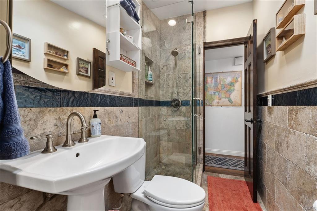 20292 Riverside Dr — updated bath with walk-in tile shower